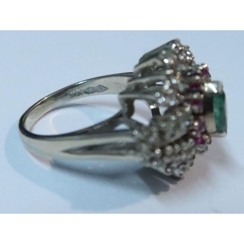 400 - A 14k emerald, ruby and white stone ring, (possibly white sapphire), weight 9g