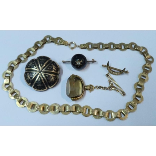 423 - A Victorian 9ct gold necklace, together with three brooches and a swivel fob