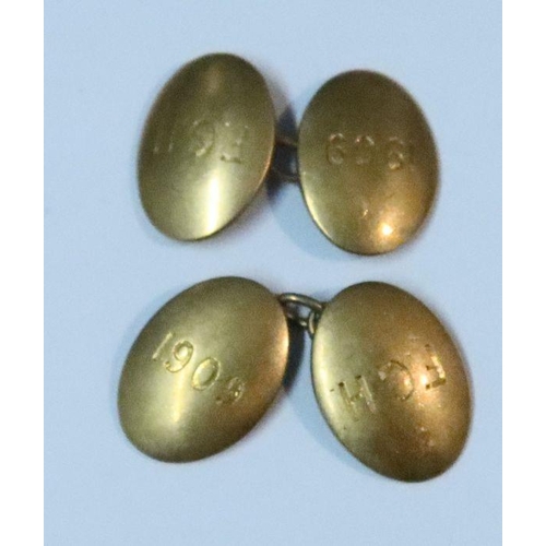 426 - A pair of 18ct gold cufflinks, engraved 1909 with initials