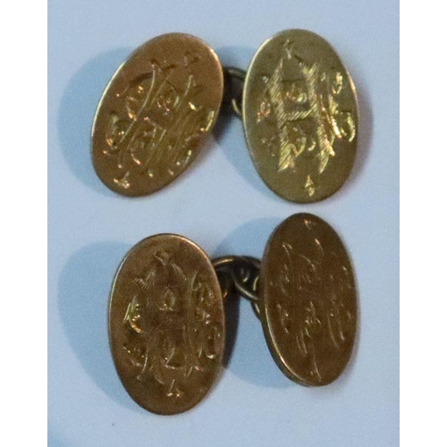 427 - A pair of 18ct gold cufflinks, engraved with a monogram