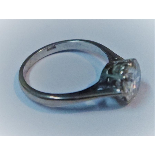 439 - An 18ct white gold solitaire diamond ring, claw set with round brilliant cut diamond of approximatel... 