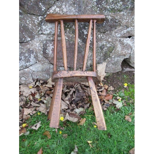 44 - A child’s primitive stick back chair