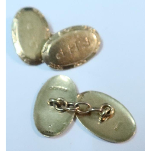 446 - A pair of 9ct gold cuff links, engraved with initials an date 1965