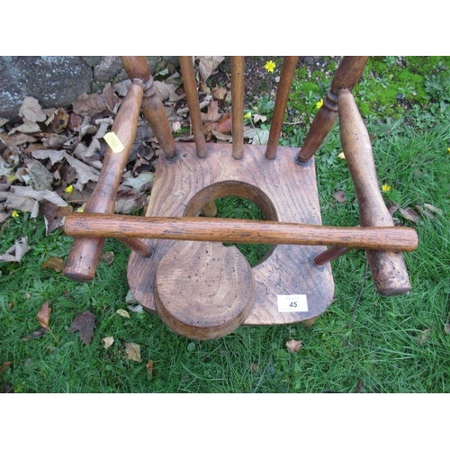 45 - An Antique elm seated child’s commode chair