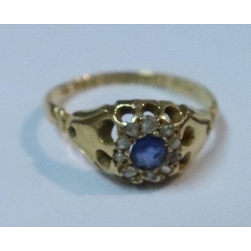 450 - A Victorian 18ct sapphire and diamond cluster ring