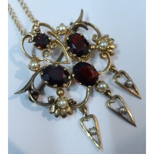 456 - A 9ct garnet and pearl openwork brooch/pendant, on fine watch chain, weight 12g