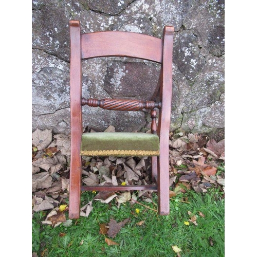 47 - A child’s Regency style mahogany chair, with upholstered seat