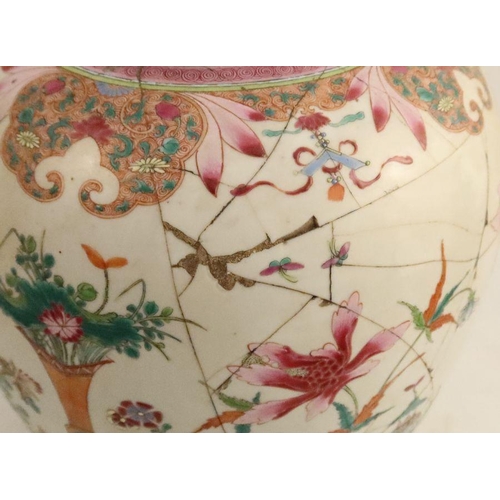 483 - An early 19th century Chinese famille rose ginger jar and cover, decorated with lotus and precious o... 