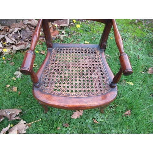 49 - A 19th century style child's chair with caned seat