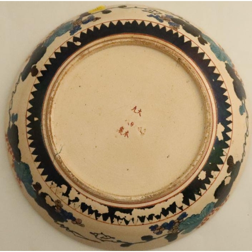 499 - An Imari dish decorated with alternating fan panels in typical palette, together with another dish d... 