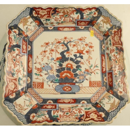 500 - A large circular Imari charger, diameter 22ins, together with a square Imari charger, with rebated c... 