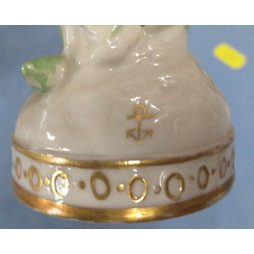 512 - A collection of Continental porcelain figures, some with mock gold anchor mark, together with two 19... 