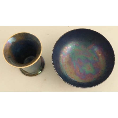 518 - A Ruskin pottery cylindrical vase, with iridescent glaze, height 3ins, together with a similar bowl,... 