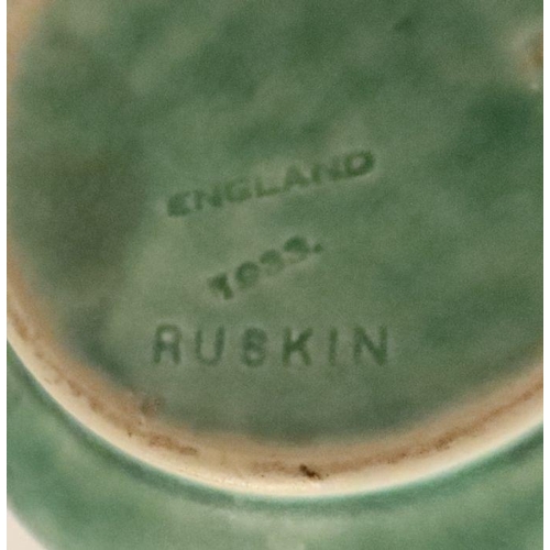 522 - Four pieces of Ruskin pottery, to include three vases and a bowl, height 7ins and down