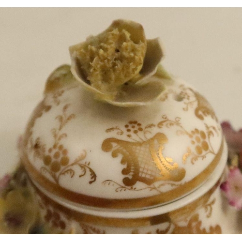 532 - A Continental porcelain miniature tea pot, encrusted with flowers, cross swords mark to base, height... 