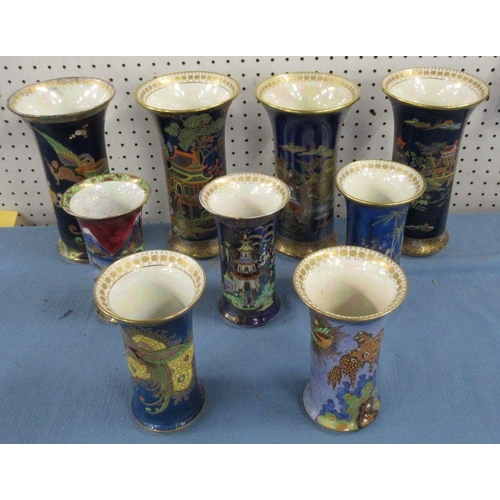 538 - A collection of Carlton Ware trumpet vases, decorated either with Oriental landscapes or Paradise Bi... 