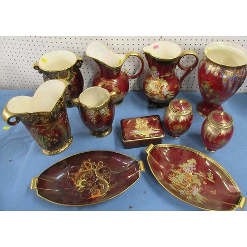 550 - A collection of Crown Devon rouge royale, to include a pair of covered vases, vases, dishes, covered... 