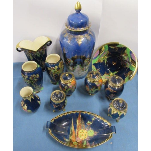 551 - A collection of Crown Devon blue lustre, to include a large covered vase decorated with a garden sce... 