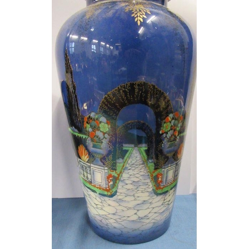 551 - A collection of Crown Devon blue lustre, to include a large covered vase decorated with a garden sce... 