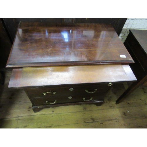 56 - An 18th century mahogany bachelors chest, having four long drawers and a cross banded top below a br... 