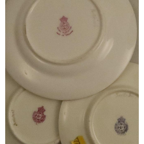 575 - Three Royal Worcester small plates, decorated with a Turtledove, a Redstart and a Bullfinch, all by ... 