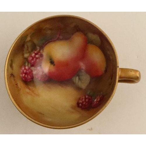 586 - A Royal Worcester miniature tea cup and saucer, hand painted with fruit by Ayrton and Everett, with ... 