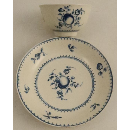 589 - A Worcester tea bowl and saucer, printed in underglaze blue with fruit to a central medallion and sp... 