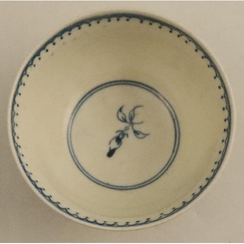 589 - A Worcester tea bowl and saucer, printed in underglaze blue with fruit to a central medallion and sp... 