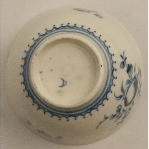 589 - A Worcester tea bowl and saucer, printed in underglaze blue with fruit to a central medallion and sp... 