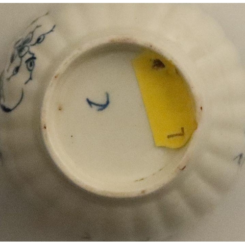 591 - A Worcester fluted cup, tea bowl and saucer, painted in underglaze blue with the Carnation pattern