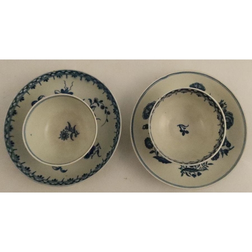 593 - Two Worcester tea bowls and saucers, decorated in underglaze blue with the Three Flowers pattern