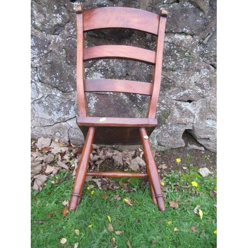 62 - A 19th century mahogany ladder back chair