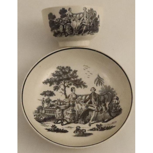 622 - A Worcester tea bowl and saucer, decorated with Hancock print The Tea Party, Maid and Page