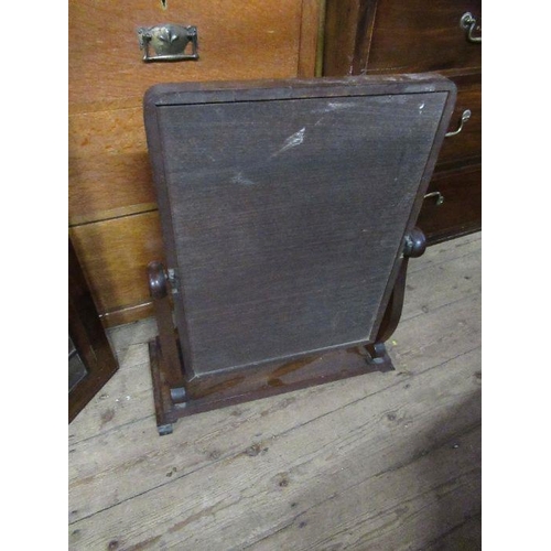 63 - A mahogany framed toilet mirror, plate dimensions 22ins x 15ins