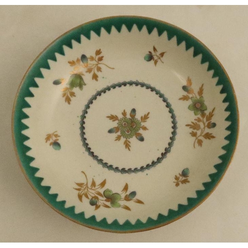 636 - A Worcester part ribbed tea bowl and saucer, decorated with greens and flower sprays