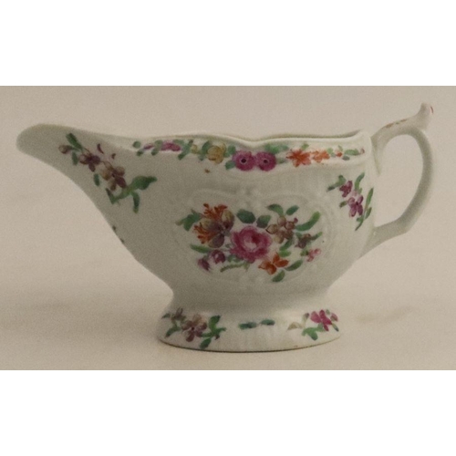 637 - A Worcester moulded sauce boat, decorated with flowers, length 5.25ins - no restoration or damage