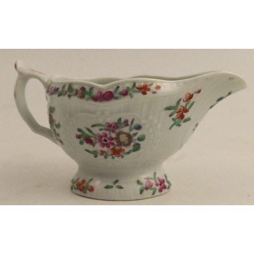 637 - A Worcester moulded sauce boat, decorated with flowers, length 5.25ins - no restoration or damage