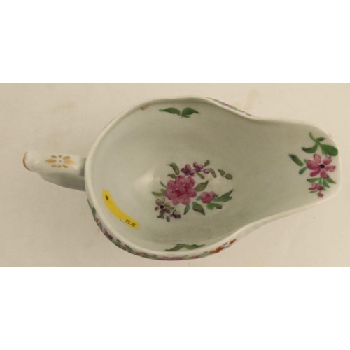 637 - A Worcester moulded sauce boat, decorated with flowers, length 5.25ins - no restoration or damage