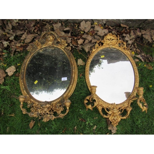 64 - Two similar 19th century style mirrors, with ornate gilt frames and sconces