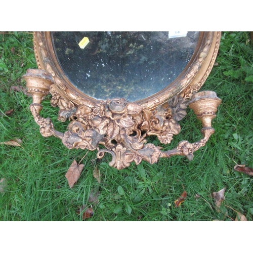 64 - Two similar 19th century style mirrors, with ornate gilt frames and sconces