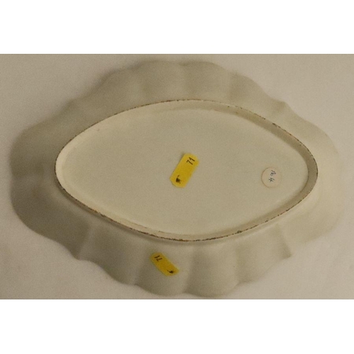 655 - A Worcester dish, of oval form decorated with sprays of flowers to a later yellow ground