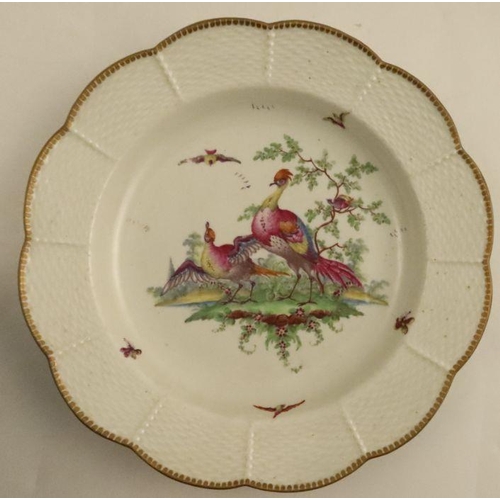 661 - Two Worcester plates, one decorated in colours with a bouquet of flowers and sprays, the other with ... 