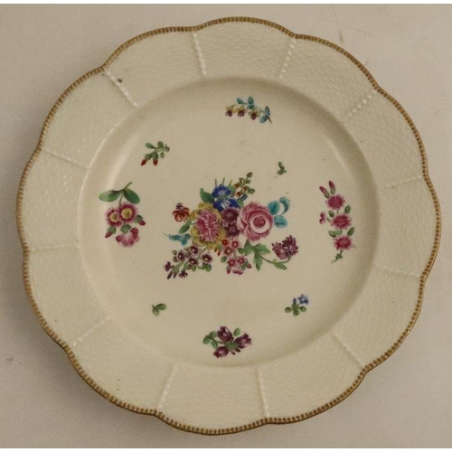 661 - Two Worcester plates, one decorated in colours with a bouquet of flowers and sprays, the other with ... 