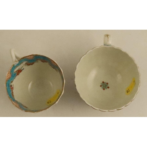 663 - A Worcester tea cup, painted in enamels with wreaths and festoons, together with another coffee cup ... 