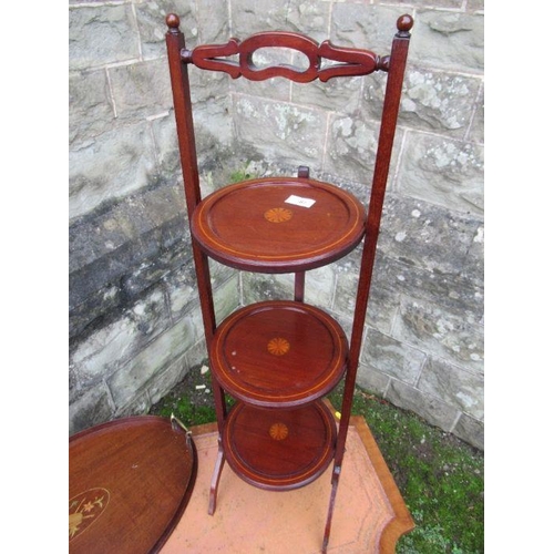 67 - 37831 An Edwardian cake stand, mahogany oval tray and a coffee table