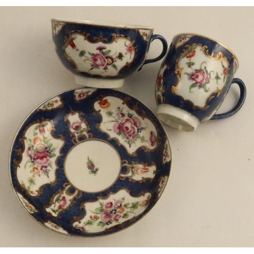 682 - A Worcester scale blue trio, decorated with reserves of flowers, saucer with script W mark - - No da... 