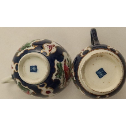 684 - A Worcester scale blue trio, decorated with exotic birds, seal mark - - No damage or restoration