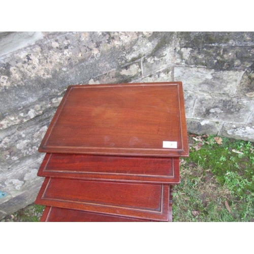 7 - A mahogany quartetto of tables, width 18ins and down