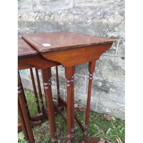 7 - A mahogany quartetto of tables, width 18ins and down