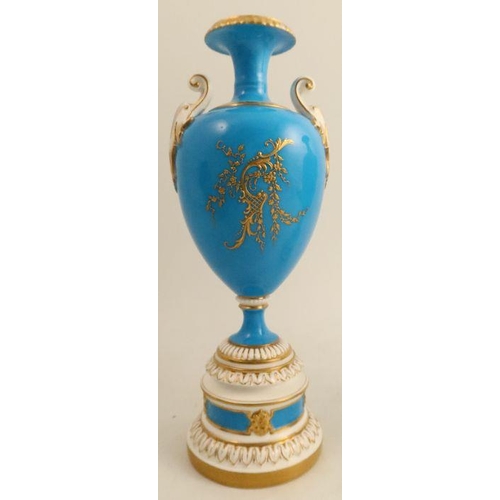 713 - A pair of Royal Worcester vases, decorated with a Sevres blue ground with good quality gilding reser... 